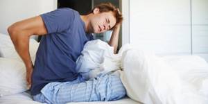 Болит спина после сна: понятие и симптоматика патологии, народные и медикаментозные особенности терапии, методы профилактики и способы диагностики