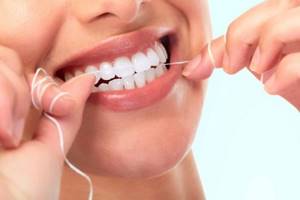 Зубная нить (флосс): как правильно пользоваться, зачем она нужна, виды, вощеная и невощеная, суперфлосс